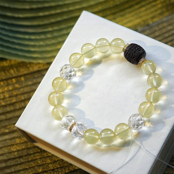 Bracciale Olivenorma in oro con perline di quarzo rutilato e citrino
