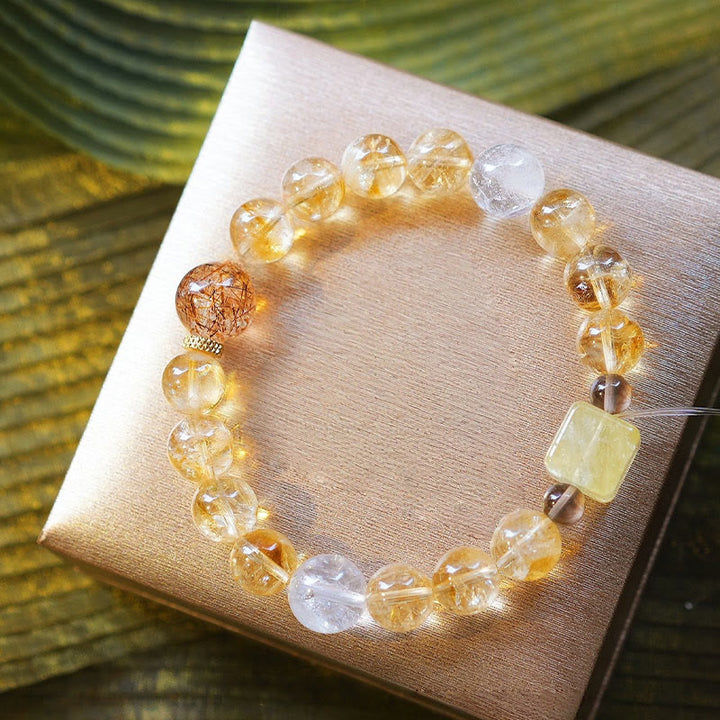 Bracciale Olivenorma in oro con perline di quarzo rutilato e citrino