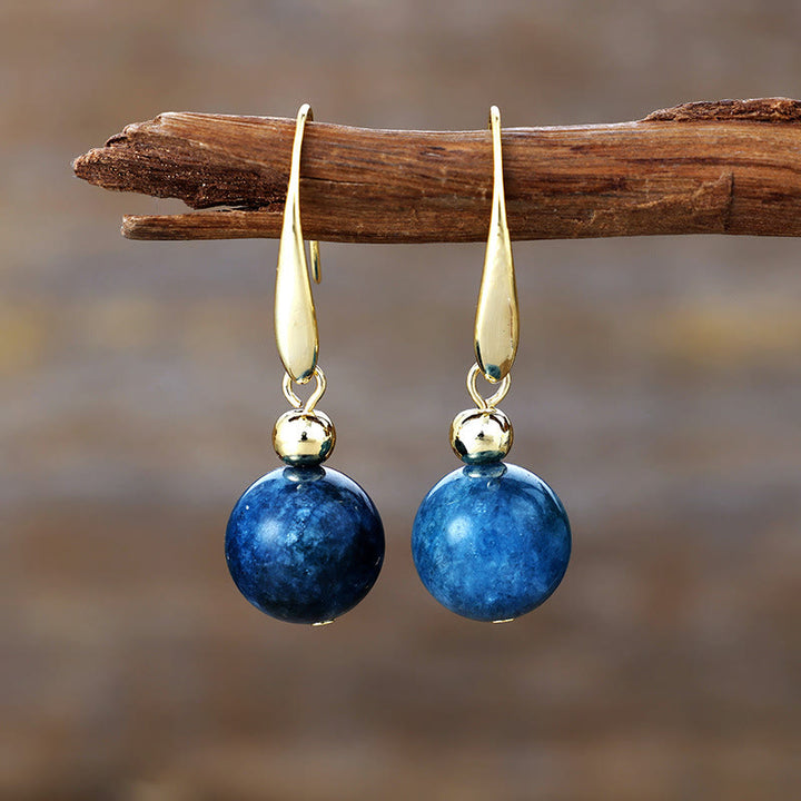 Orecchini pendenti con sfera di cristallo naturale Olivenorma