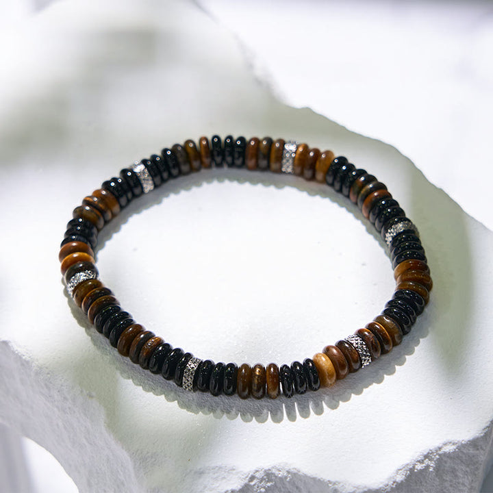 Braccialetto con perline a rullo in occhio di tigre e onice nero Olivenorma