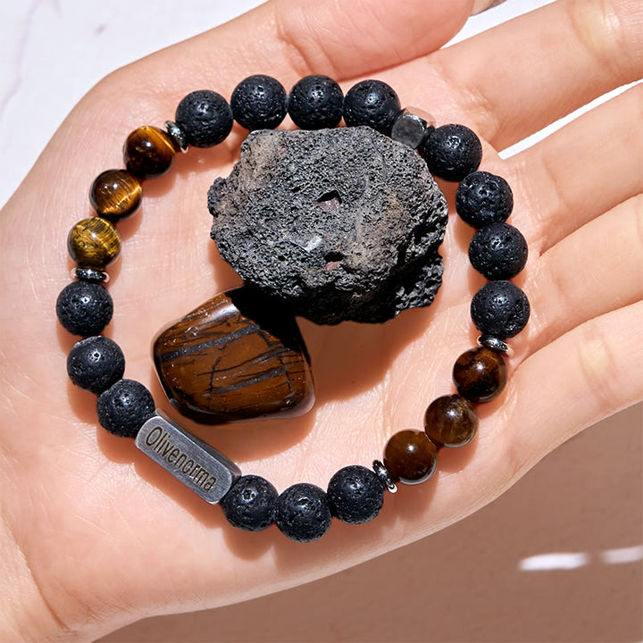 Bracciale con perline in pietra naturale Olivenorma inciso - image 2