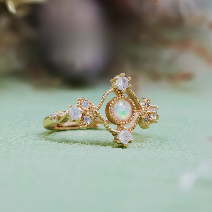 Anello Olivenorma con foglia cava in zircone bianco opale naturale