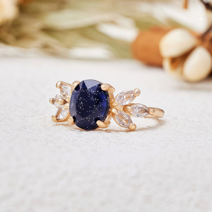 Anello Olivenorma con foglia di zircone in arenaria blu taglio ovale