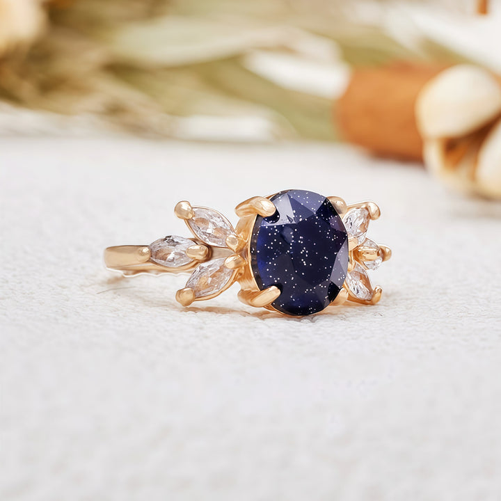 Anello Olivenorma con foglia di zircone in arenaria blu taglio ovale