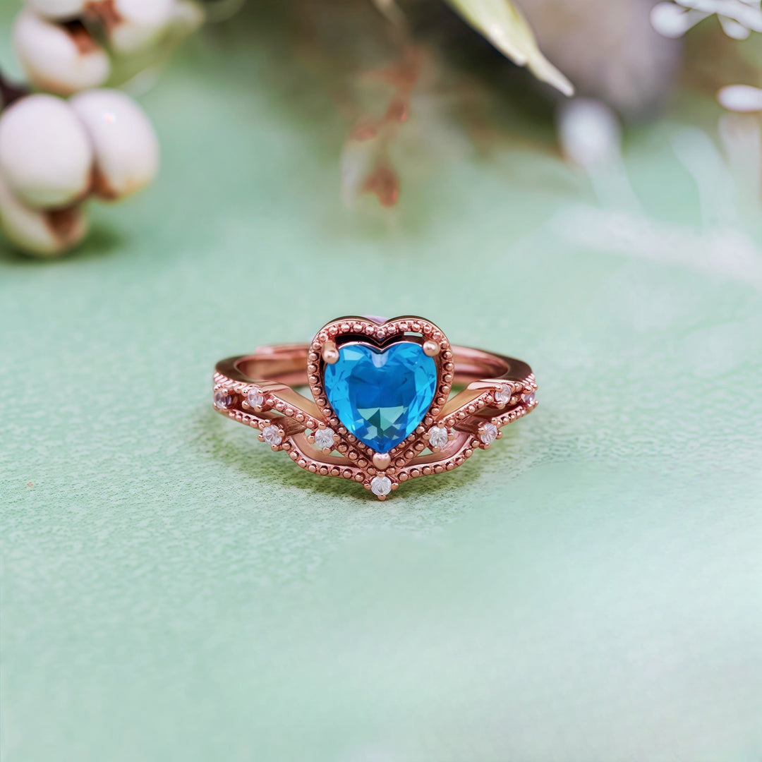 Anello a forma di cuore con topazio blu Olivenorma a forma di corona