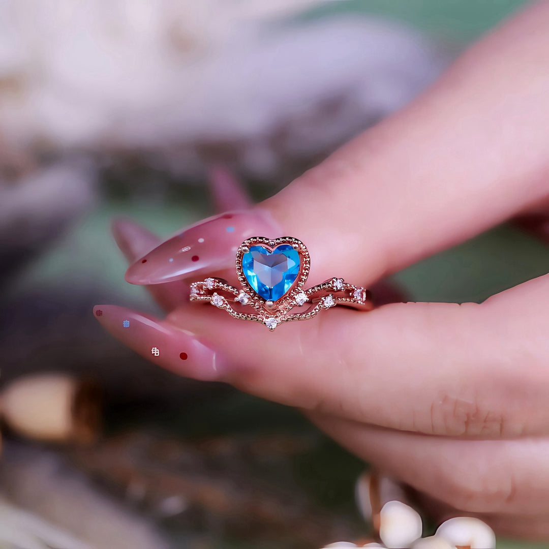 Anello a forma di cuore con topazio blu Olivenorma a forma di corona