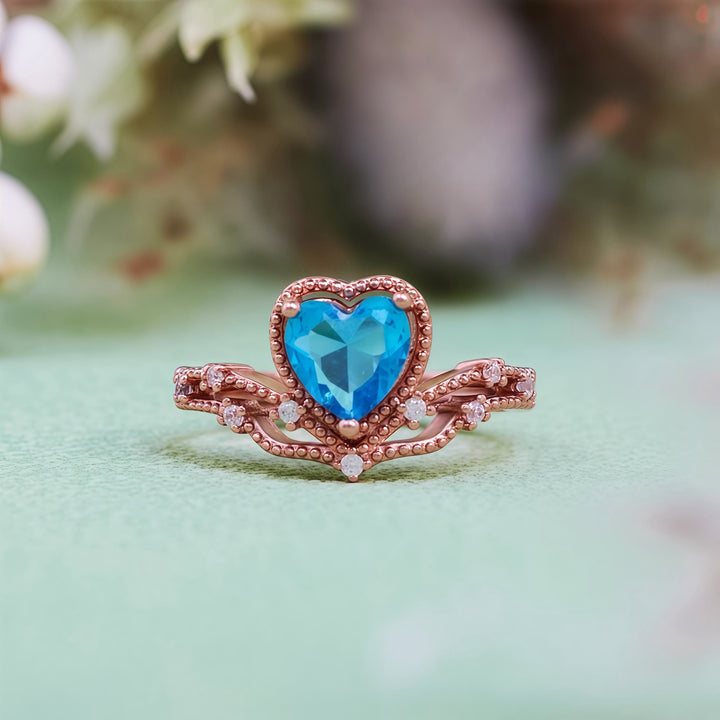Anello a forma di cuore con topazio blu Olivenorma a forma di corona