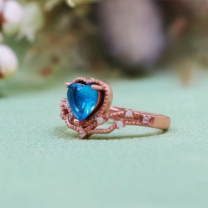 Anello a forma di cuore con topazio blu Olivenorma a forma di corona