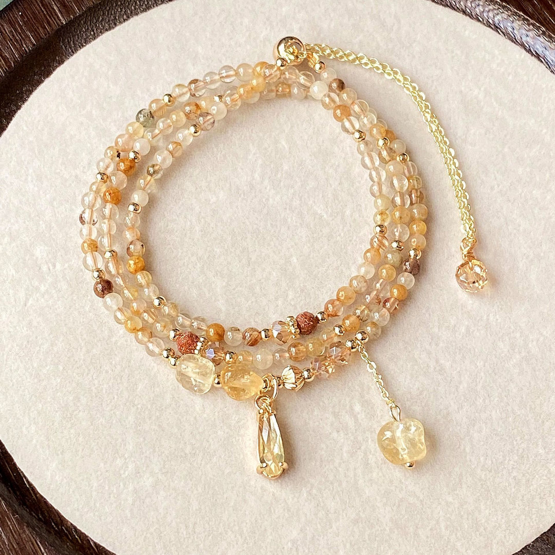 Collana con bracciale e perle di quarzo rutilato color oro citrino Olivenorma