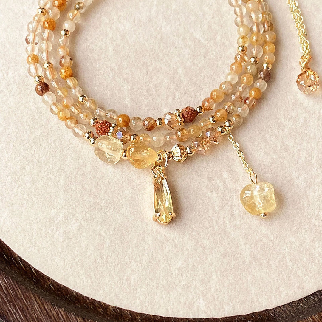 Collana con bracciale e perle di quarzo rutilato color oro citrino Olivenorma