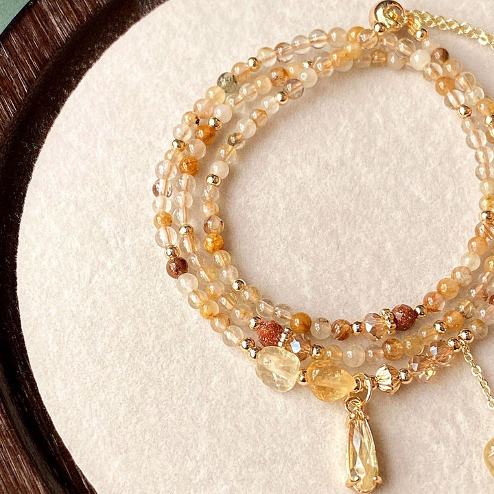 Collana con bracciale e perle di quarzo rutilato color oro citrino Olivenorma