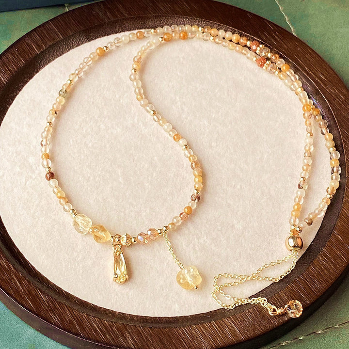 Collana con bracciale e perle di quarzo rutilato color oro citrino Olivenorma