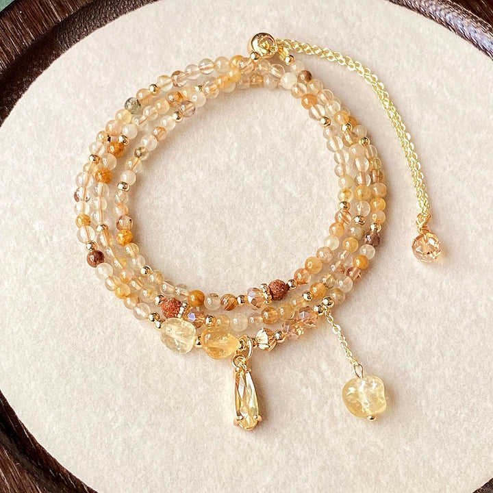 Collana con bracciale e perle di quarzo rutilato color oro citrino Olivenorma