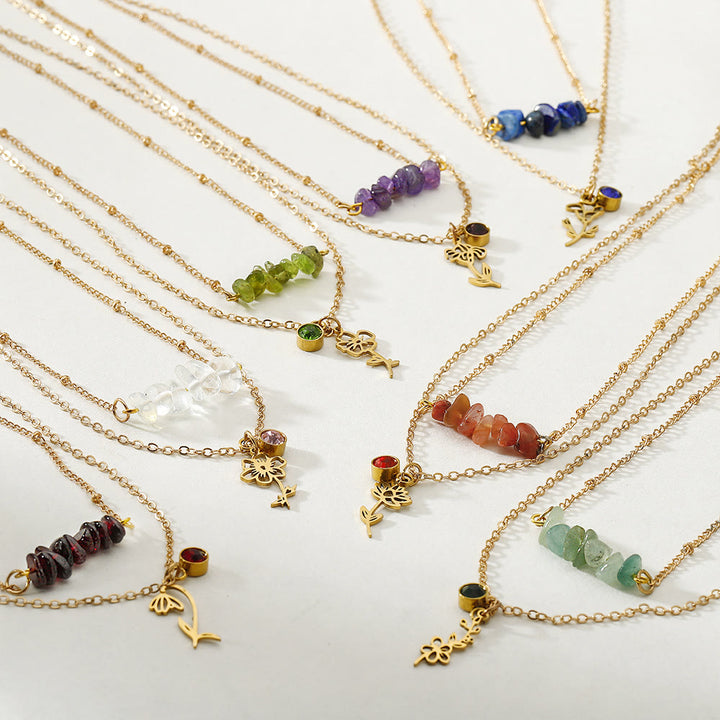 Collana con pietra portafortuna in pietra naturale Olivenorma con fiore di nascita