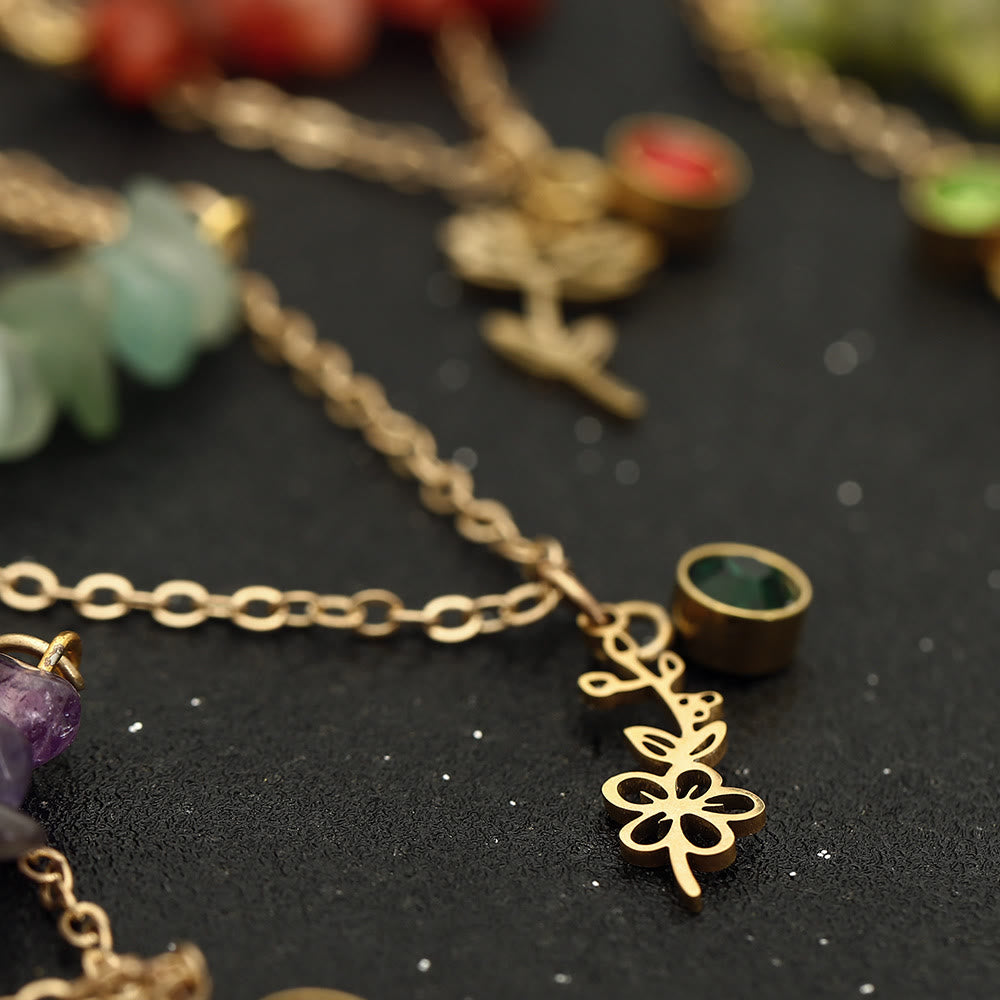 Collana con pietra portafortuna in pietra naturale Olivenorma con fiore di nascita