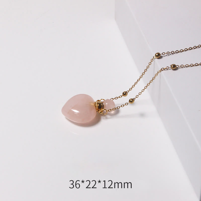 Collana con diffusore di oli essenziali in cristallo Olivenorma e bottiglia a forma di cuore