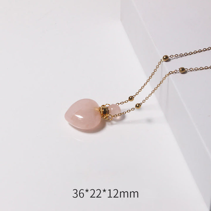 Collana con diffusore di oli essenziali in cristallo Olivenorma e bottiglia a forma di cuore