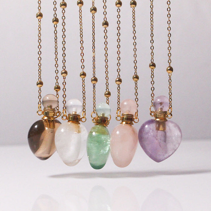 Collana con diffusore di oli essenziali in cristallo Olivenorma e bottiglia a forma di cuore