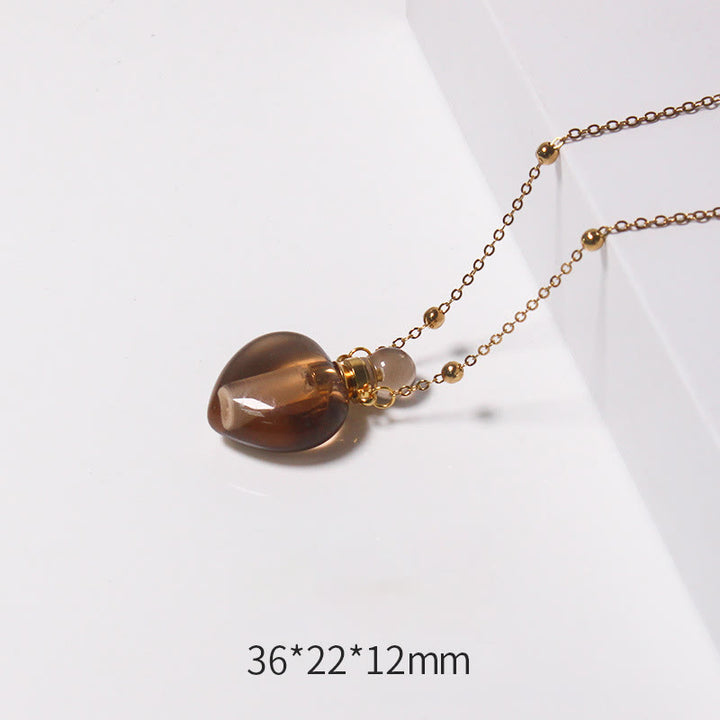 Collana con diffusore di oli essenziali in cristallo Olivenorma e bottiglia a forma di cuore