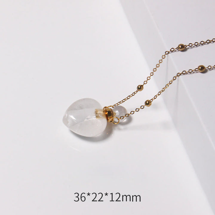 Collana con diffusore di oli essenziali in cristallo Olivenorma e bottiglia a forma di cuore