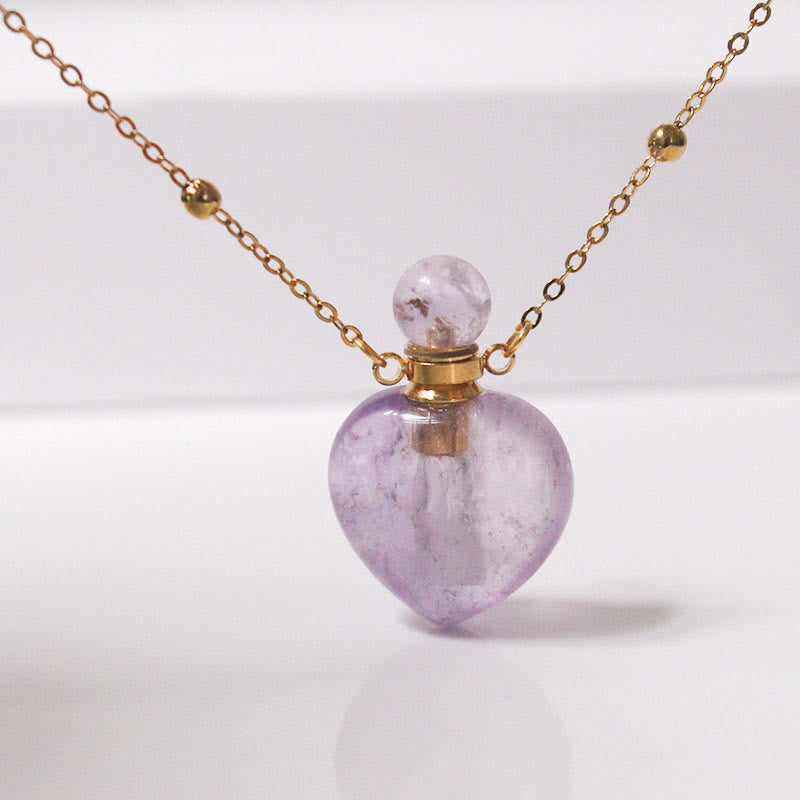 Collana con diffusore di oli essenziali in cristallo Olivenorma e bottiglia a forma di cuore