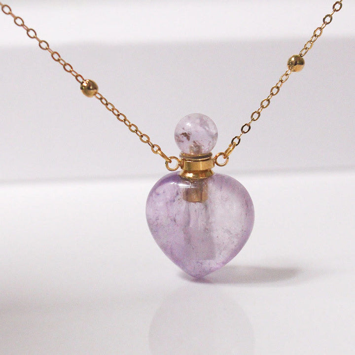 Collana con diffusore di oli essenziali in cristallo Olivenorma e bottiglia a forma di cuore