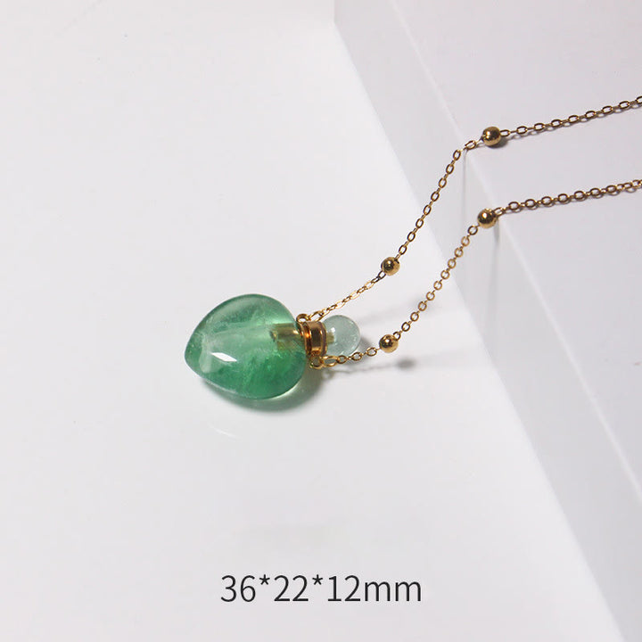 Collana con diffusore di oli essenziali in cristallo Olivenorma e bottiglia a forma di cuore