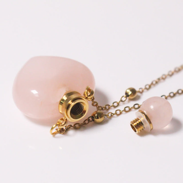 Collana con diffusore di oli essenziali in cristallo Olivenorma e bottiglia a forma di cuore