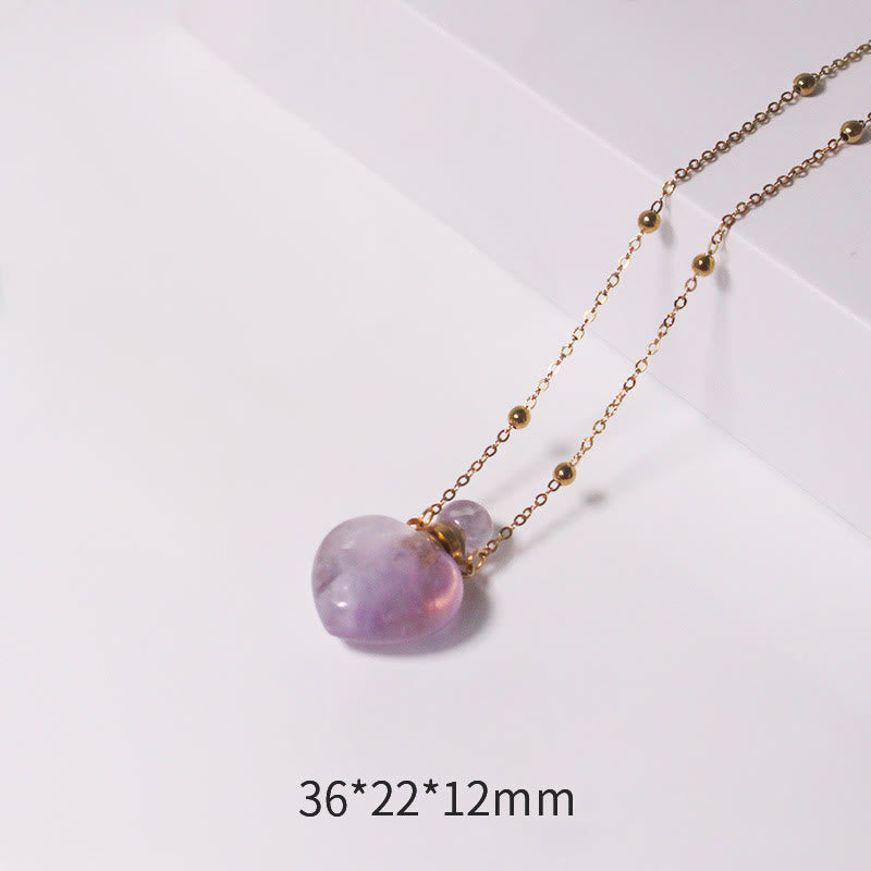 Collana con diffusore di oli essenziali in cristallo Olivenorma e bottiglia a forma di cuore