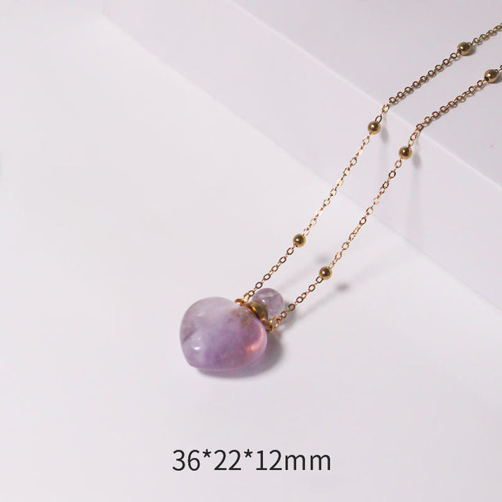 Collana con diffusore di oli essenziali in cristallo Olivenorma e bottiglia a forma di cuore