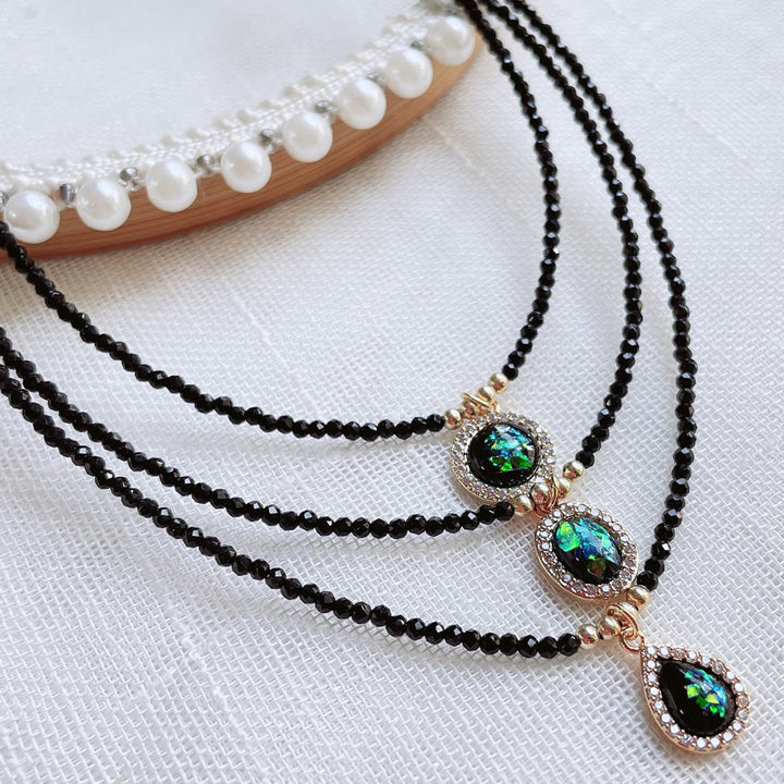Collana con ciondolo in opale verde Olivenorma e perline in ossidiana