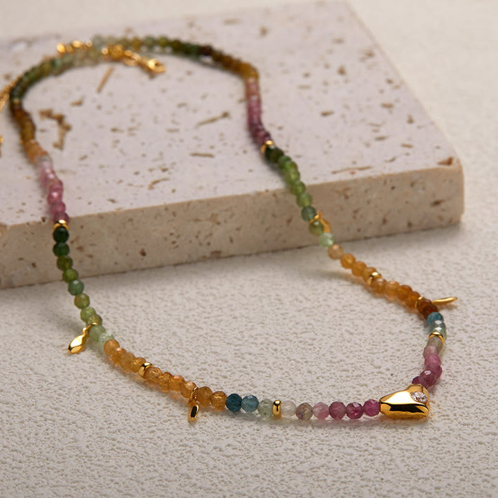 Collana con ciondolo a forma di cuore con perline in zircone bianco e tormalina Olivenorma
