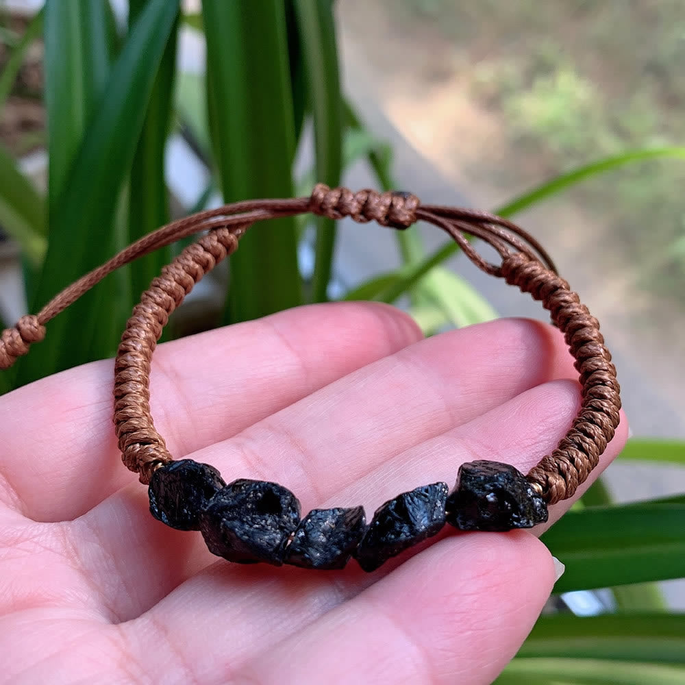 Braccialetto con coulisse intrecciato con elementi naturali irregolari Olivenorma
