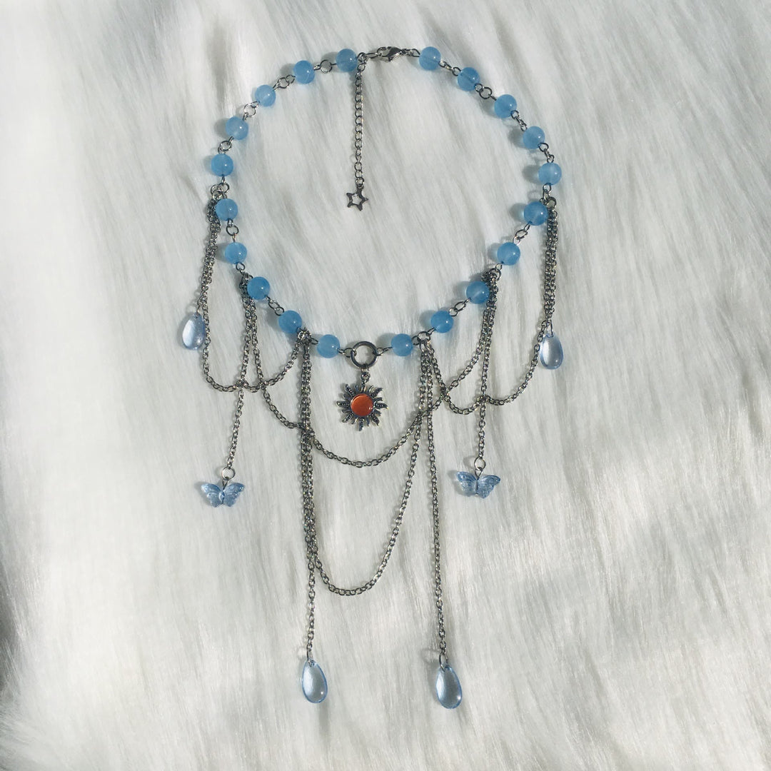 Collana girocollo a strati con farfalla solare in acquamarina Olivenorma