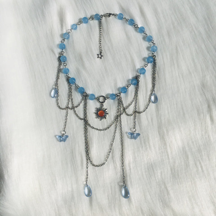 Collana girocollo a strati con farfalla solare in acquamarina Olivenorma