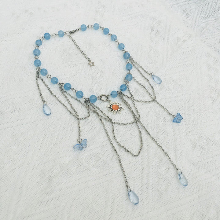 Collana girocollo a strati con farfalla solare in acquamarina Olivenorma