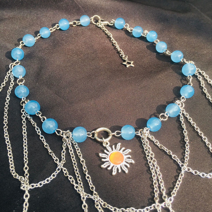 Collana girocollo a strati con farfalla solare in acquamarina Olivenorma