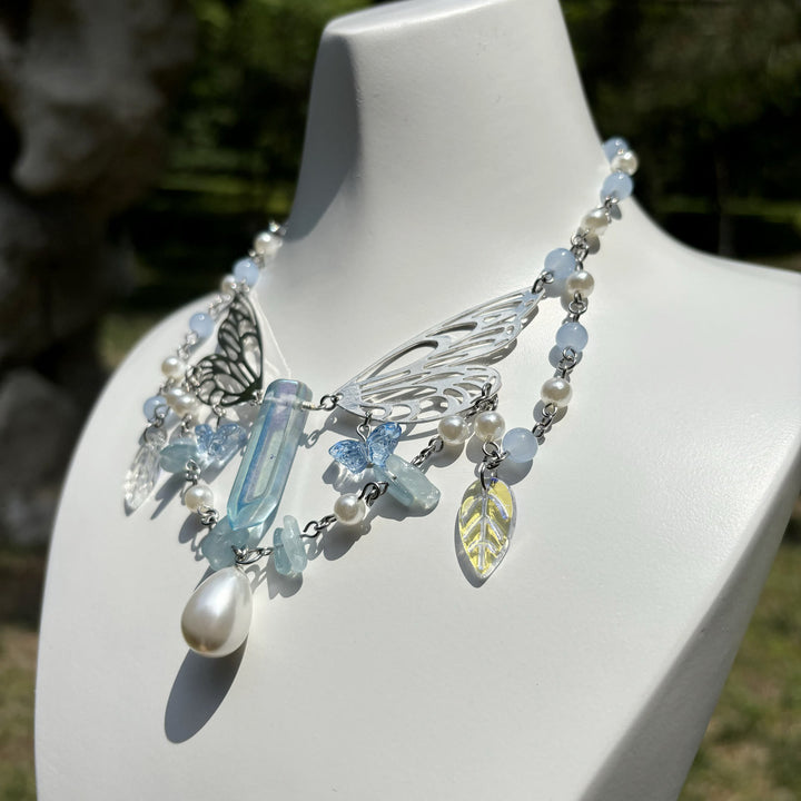 Collana girocollo a strati con ali di fata color acquamarina Olivenorma
