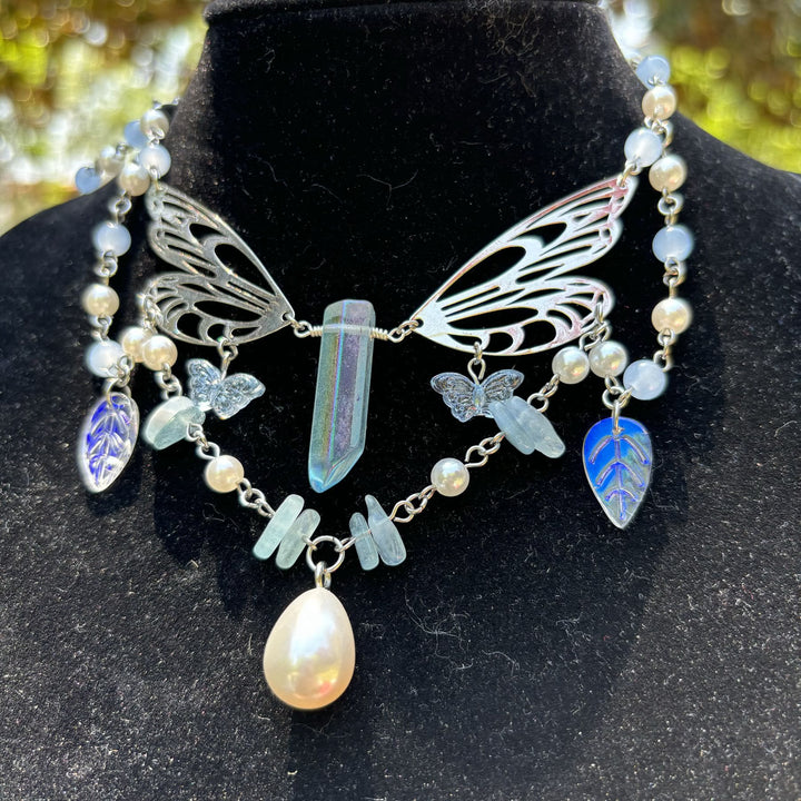 Collana girocollo a strati con ali di fata color acquamarina Olivenorma