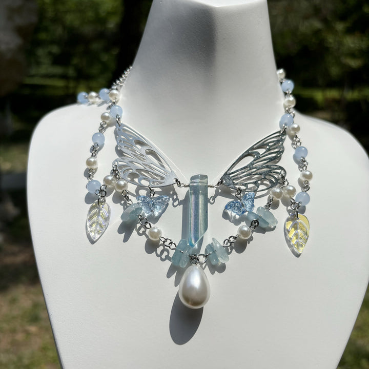 Collana girocollo a strati con ali di fata color acquamarina Olivenorma
