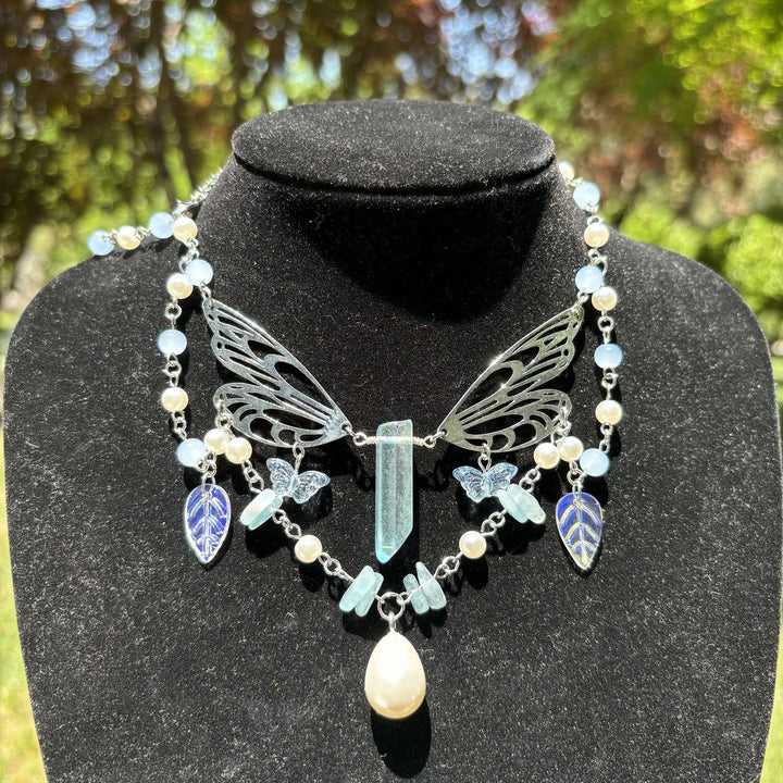 Collana girocollo a strati con ali di fata color acquamarina Olivenorma