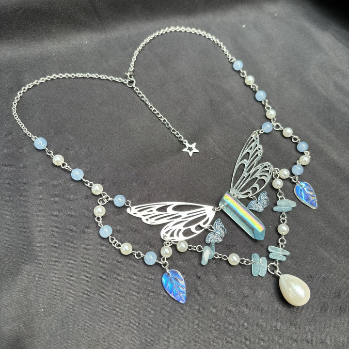 Collana girocollo a strati con ali di fata color acquamarina Olivenorma