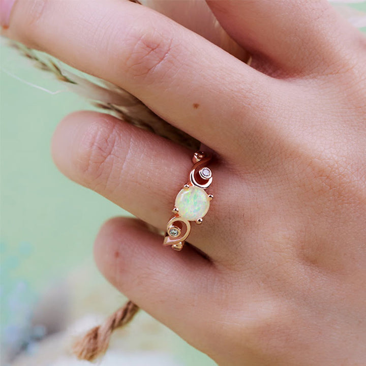 Anello Olivenorma con vite in opale bianco viola naturale