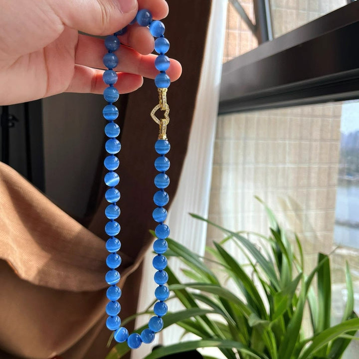 Collana di perline in pietra occhio di gatto blu Olivenorma