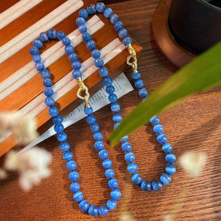 Collana di perline in pietra occhio di gatto blu Olivenorma