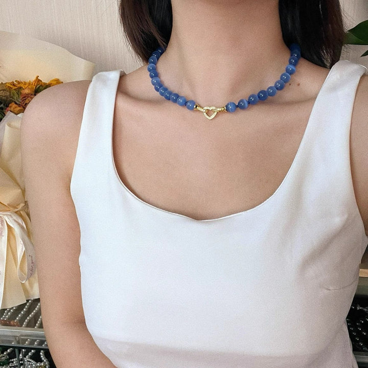 Collana di perline in pietra occhio di gatto blu Olivenorma