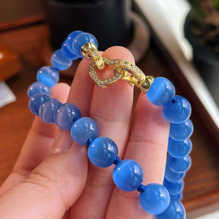 Collana di perline in pietra occhio di gatto blu Olivenorma