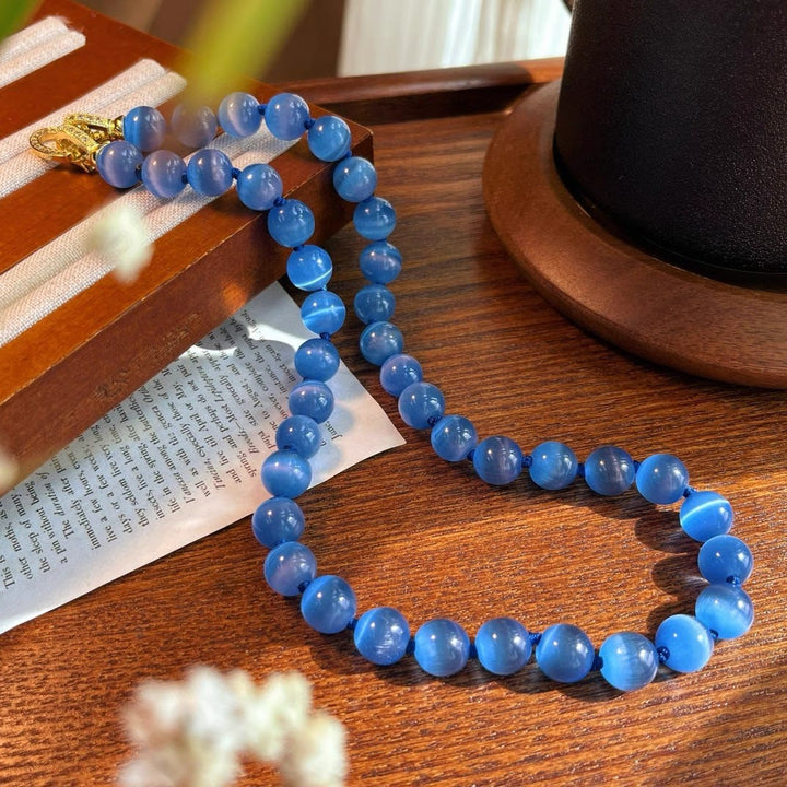 Collana di perline in pietra occhio di gatto blu Olivenorma