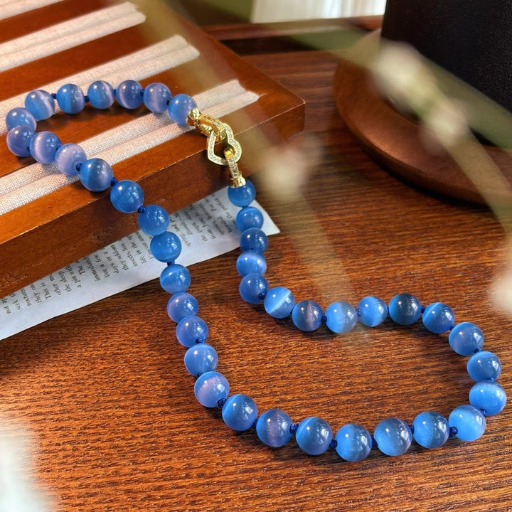 Collana di perline in pietra occhio di gatto blu Olivenorma