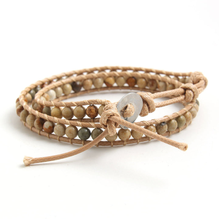 Olivenorma Bracciale intrecciato in corda di pelle con perline di pietra naturale